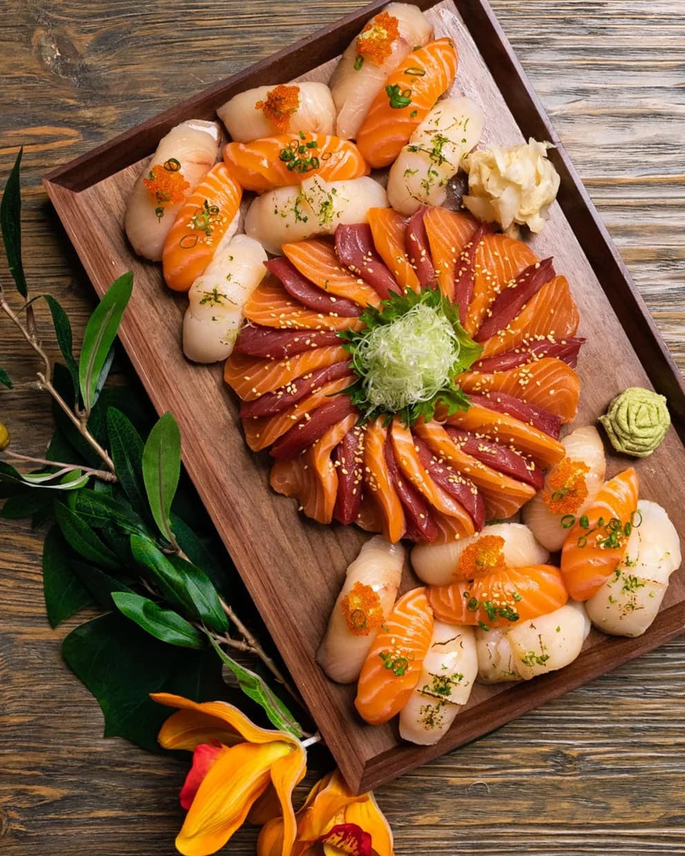 Sashimi and nigiri platter with salmon, tuna and scallop at a 3Fils catered event